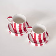 Set de deux tasses espresso rayées rouge et blanc avec soucoupes assorties, collection STRIPES TRAMONTO de MAGAZIN MINORI.