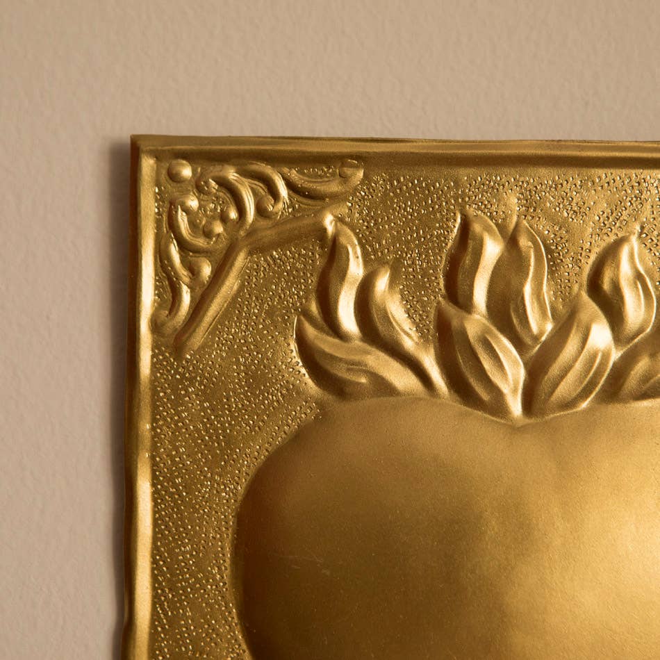 Bougeoir mural cœur flamboyant – métal doré