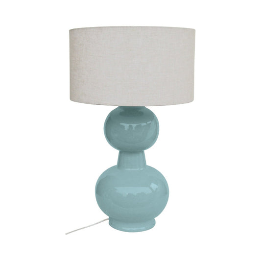 Grande lampe LAKI avec pied en métal bleu givré et abat-jour en tissu de OPJET PARIS
