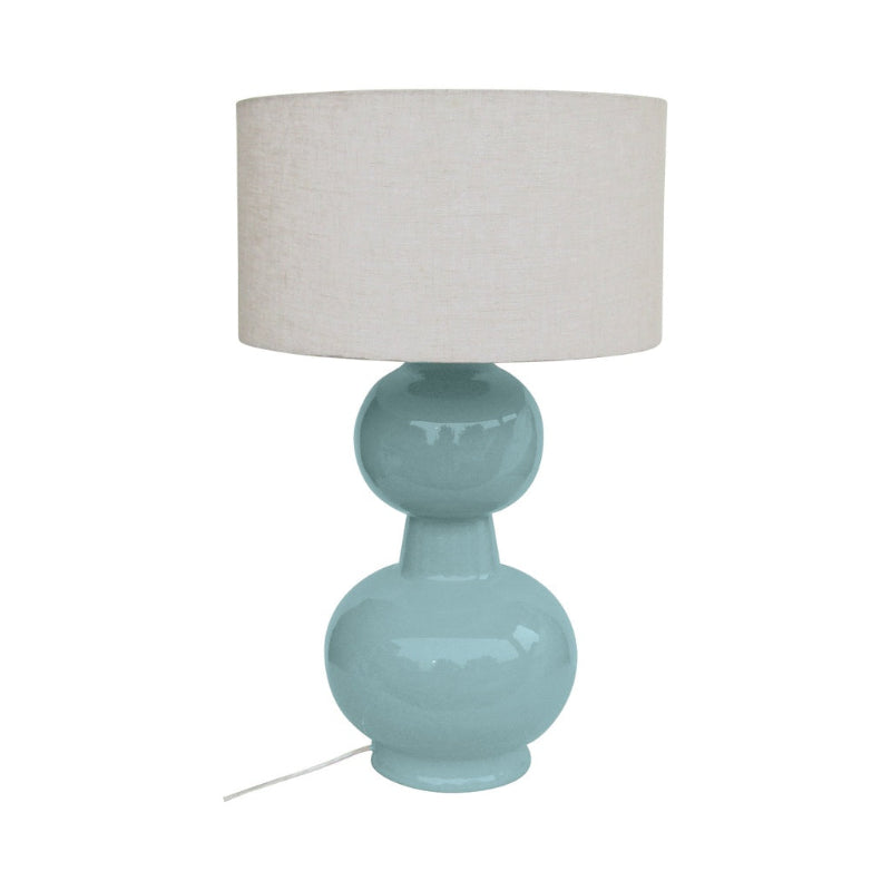 Grande lampe LAKI avec pied en métal bleu givré et abat-jour en tissu de OPJET PARIS