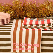 Lot de deux serviettes en coton rayées pécan et blanches, avec message rose « YOU CAN DANCE ON THE TABLE », Rose in April.