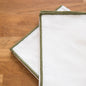 Lot de 2 serviettes en lin à bord contrasté